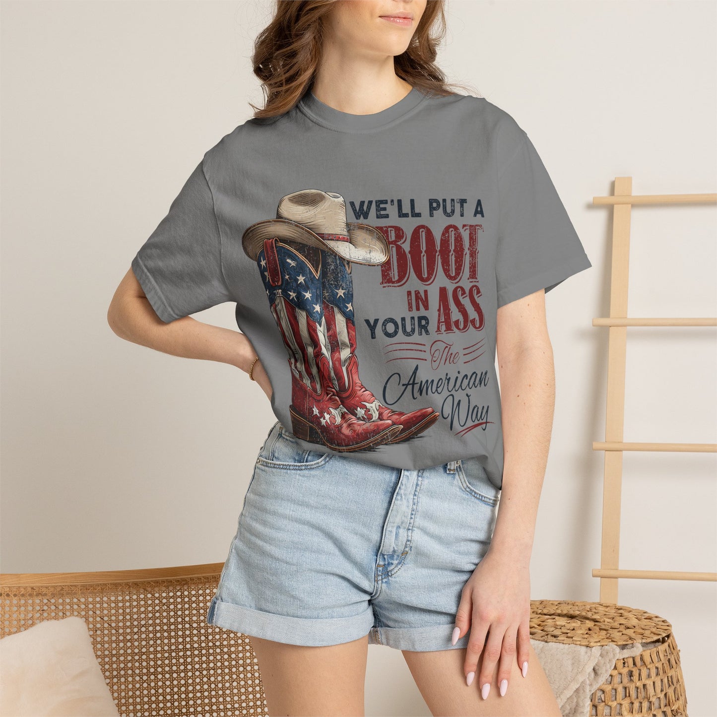 Patriotic Cowboy Boot T-Shirt — "We’ll Put a Boot in Your Ass the American Way"