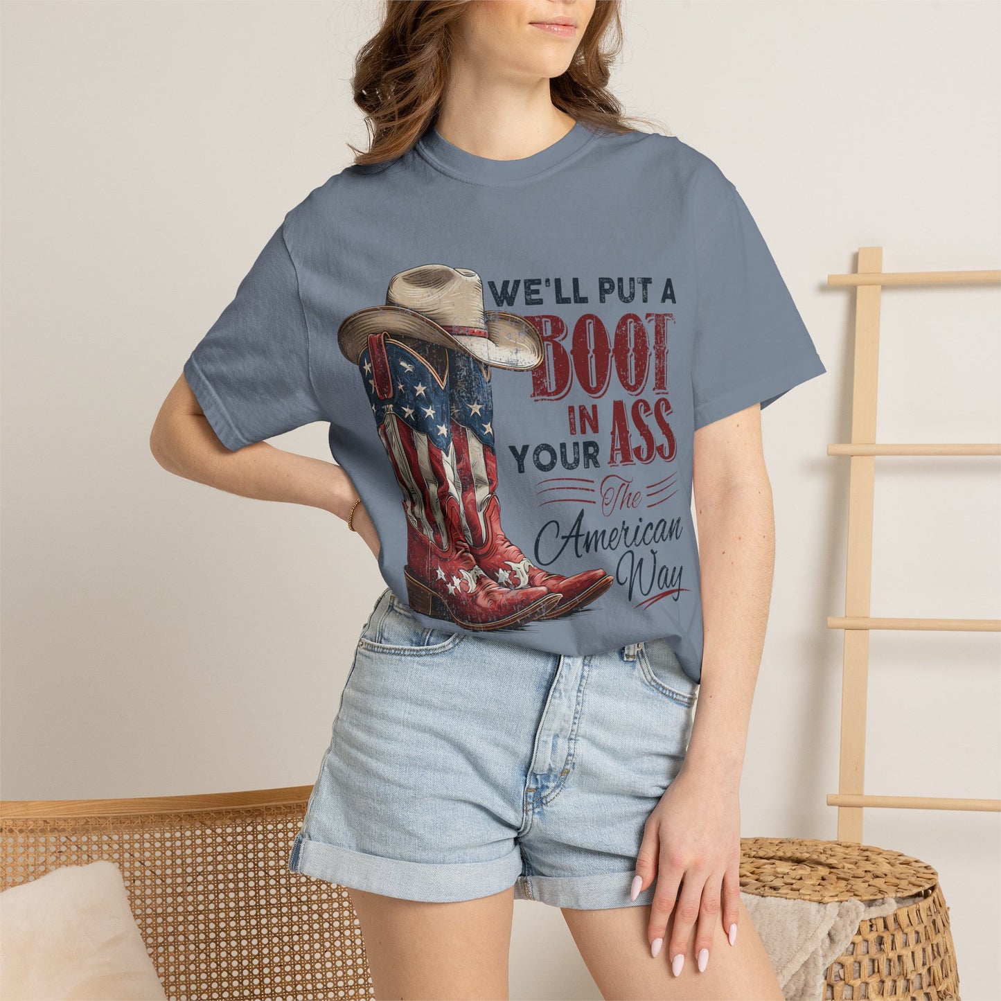 Patriotic Cowboy Boot T-Shirt — "We’ll Put a Boot in Your Ass the American Way"