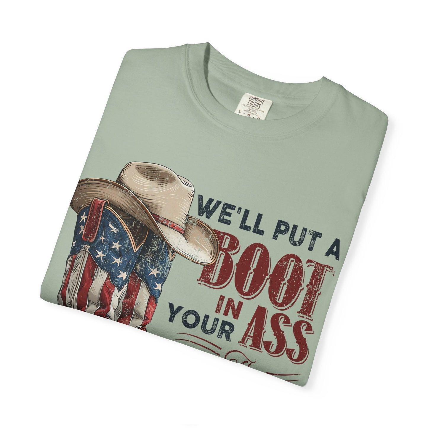Patriotic Cowboy Boot T-Shirt — "We’ll Put a Boot in Your Ass the American Way"