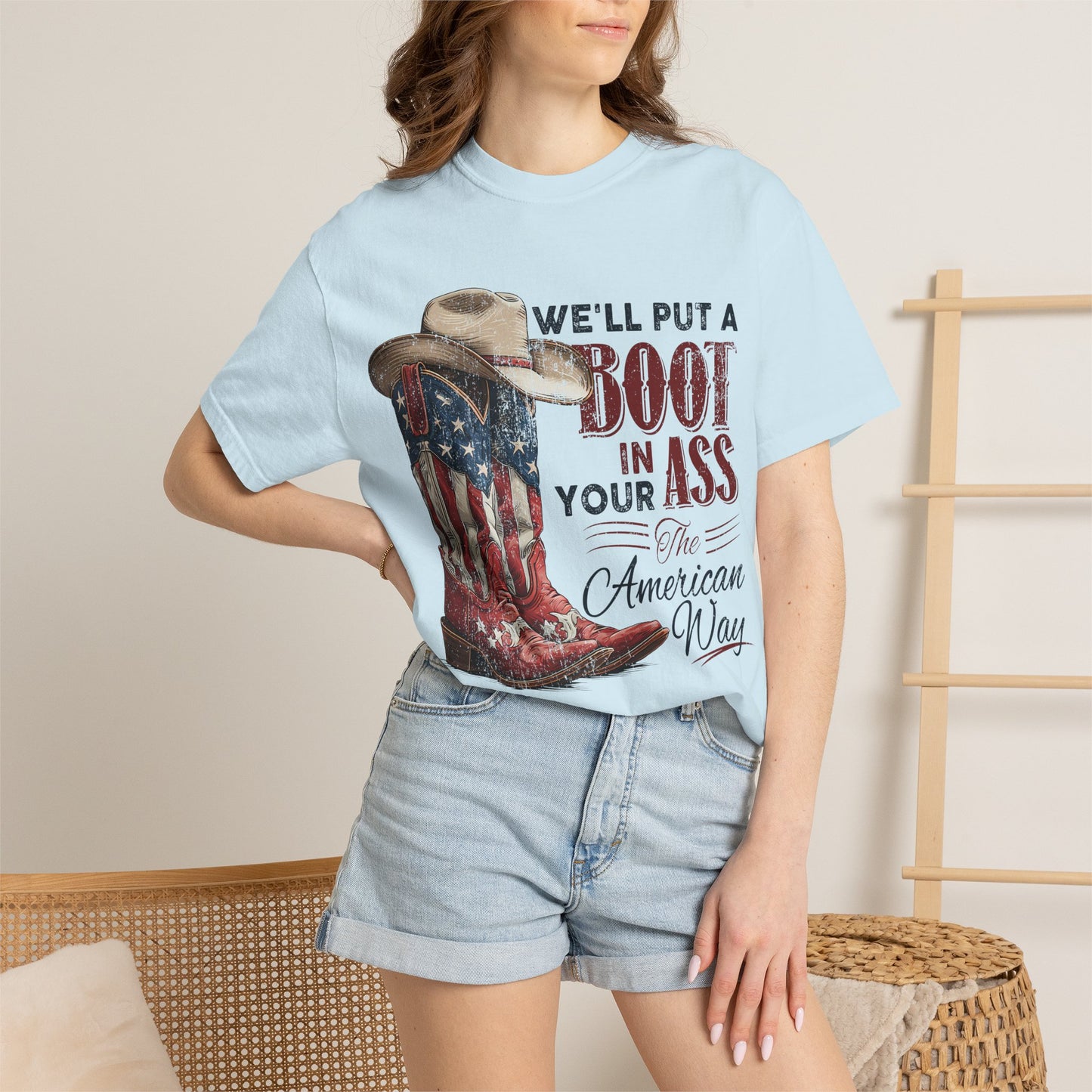 Patriotic Cowboy Boot T-Shirt — "We’ll Put a Boot in Your Ass the American Way"