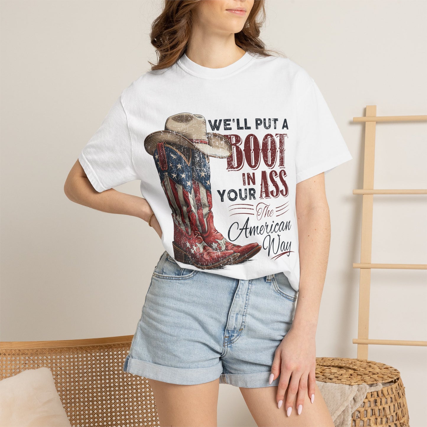 Patriotic Cowboy Boot T-Shirt — "We’ll Put a Boot in Your Ass the American Way"